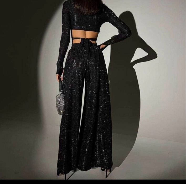 Жіночий блискучий костюм, топ і брюки