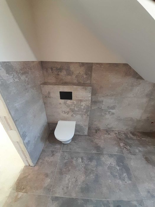 Wykończenia wnętrz Remonty Mieszkań Kuchnie Łazienki Układanie Płytek