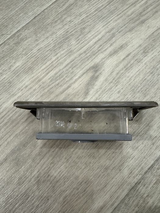 Плафон подсветки номера Kia Magentis