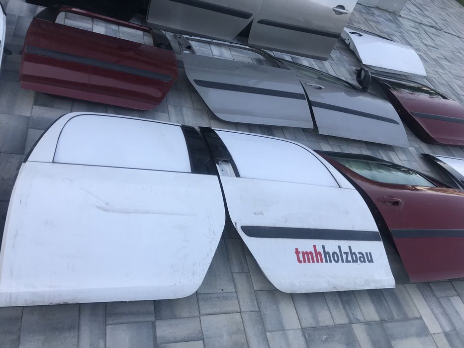 Двері ліві перед , дверь ліва задня skoda roomster 9102 срібло, замок