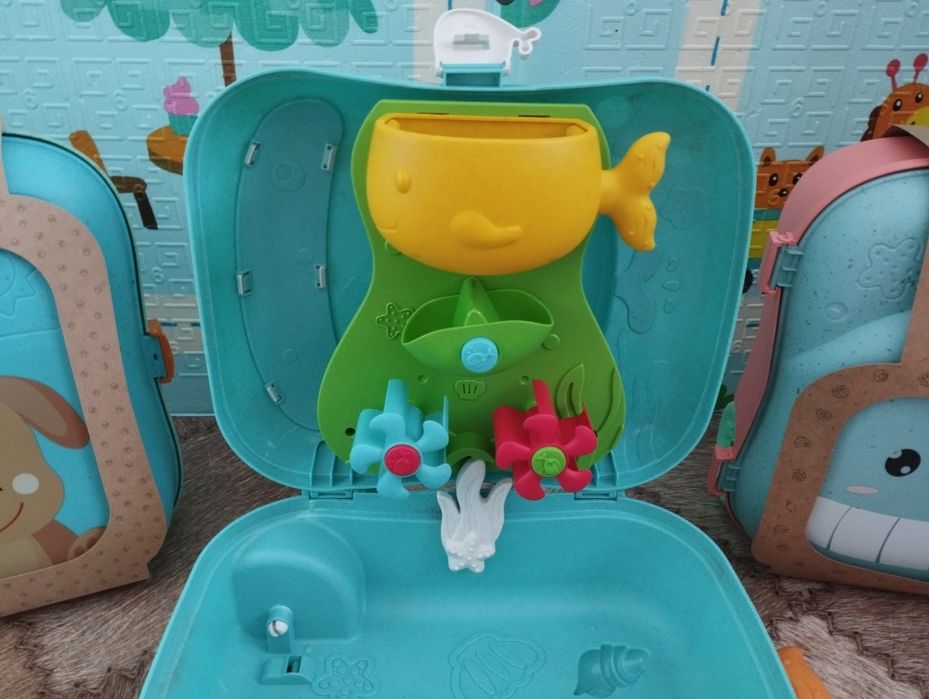 Рюкзачки та валізи з аксесуарами для піску та води