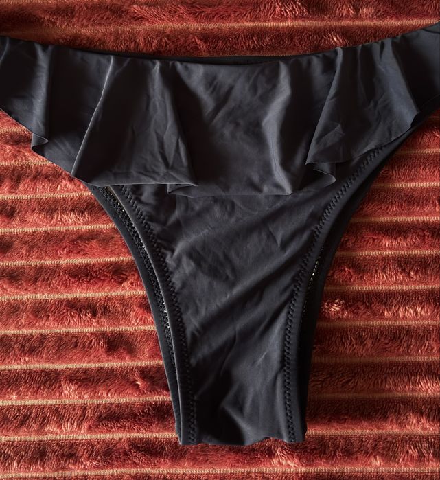 Cueca de biquíni azul com laços