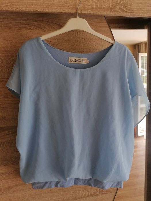 Błękitna bluzka nietoperz