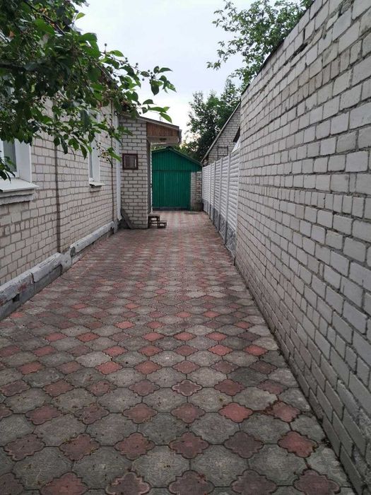 Продам 1/2 дома на Салтовке в районе парка Победы.
