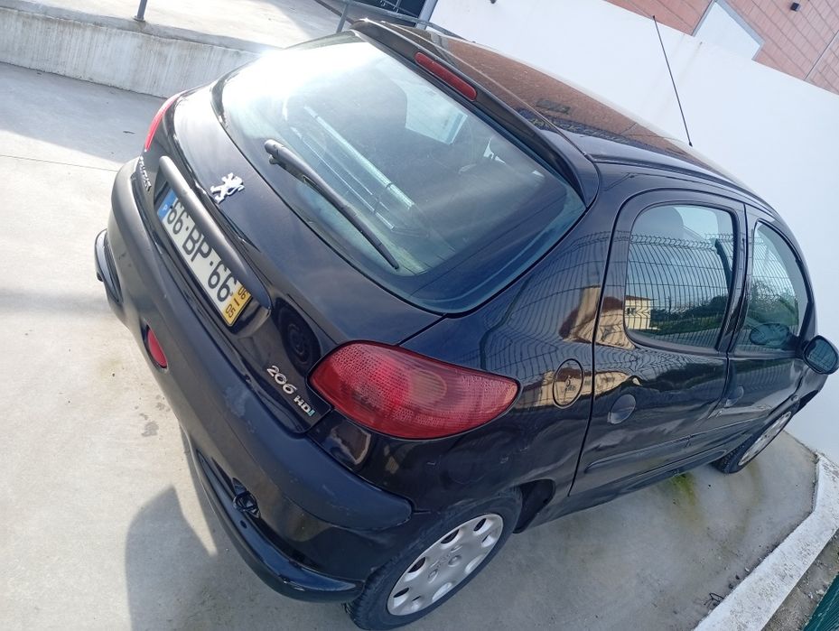 Peugeot 206       2005 a gasolina  leia a descrição