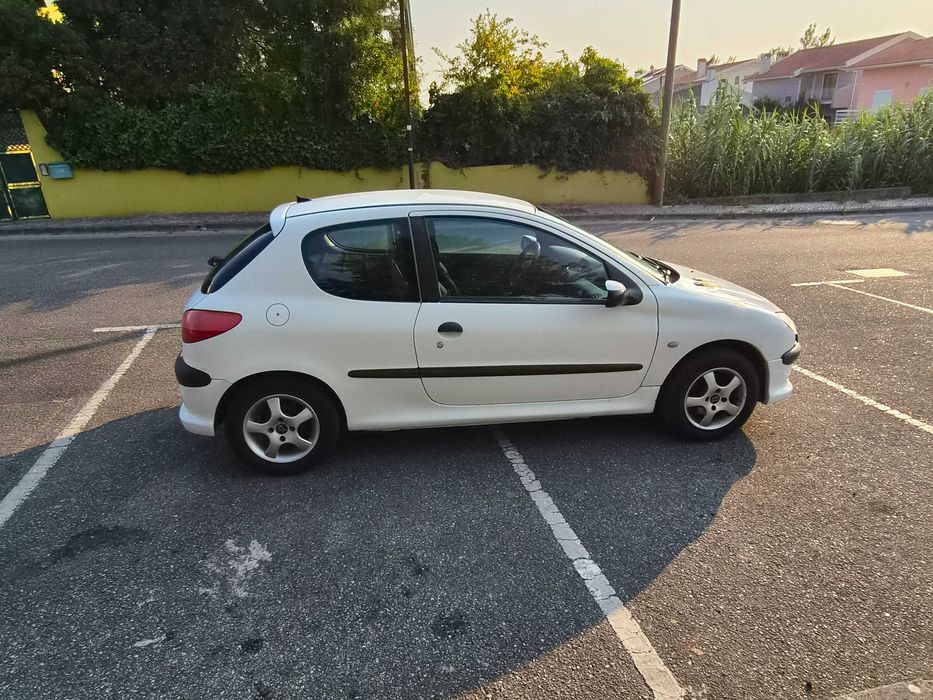 Peugeot 206 HDi 90cv - 2 lugares branco com 332.000 Km