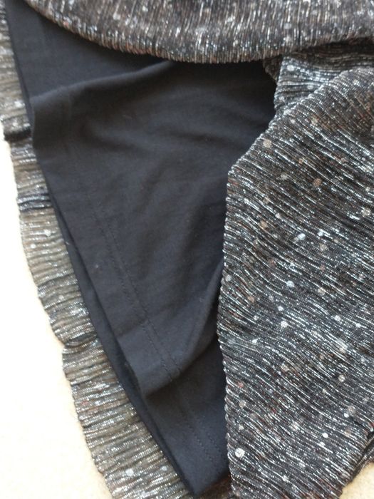 Piękna spódnica z błyszczącym tiulem w gumkę Sinsay na 134