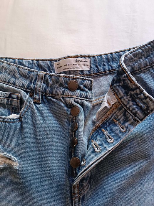 Calças de ganga rasgadas