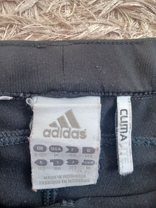 Spodnie rybaczki adidas. Getry.