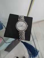Michael Kors como novo