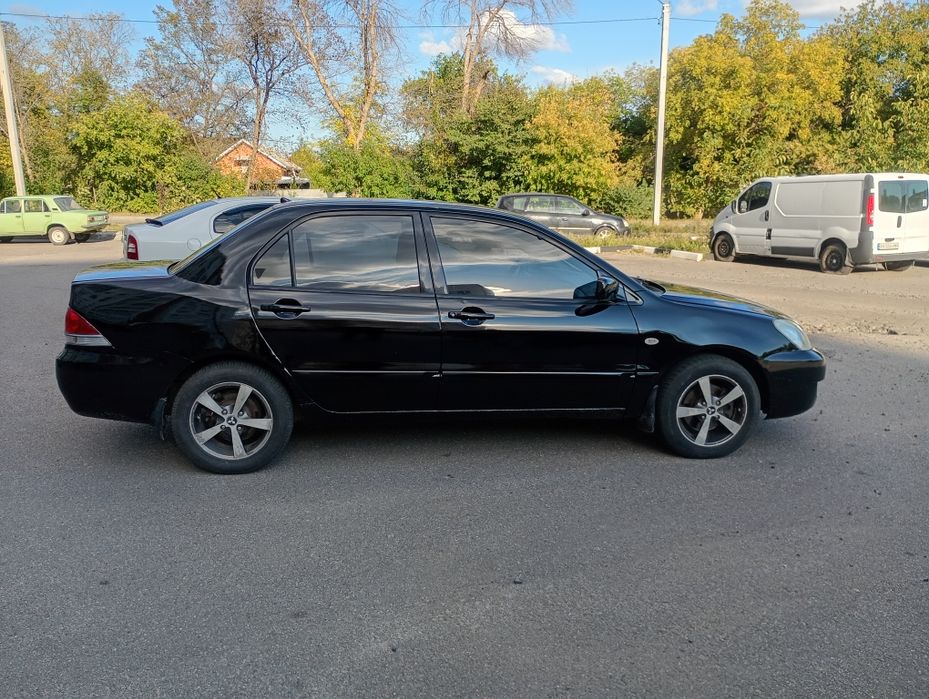 Продам  Mitsubishi lancer газ -бензин