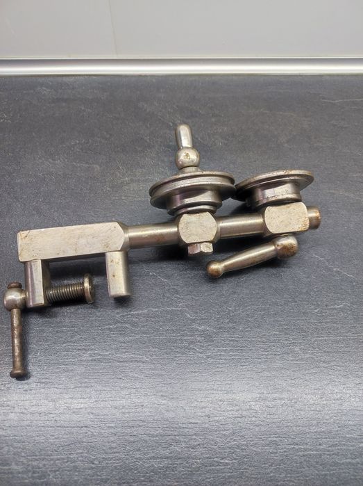 Ключ/ машинка для выравнивания крышок