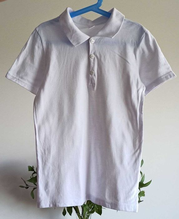 Polo unissexo de manga curta, o uniforme escolar. Tamanho 11 anos.