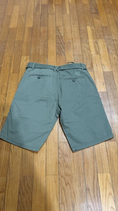 Calções verdes da American College