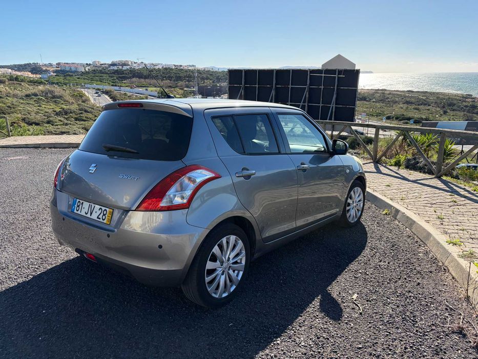 Suzuki Swift 201064628697484033124