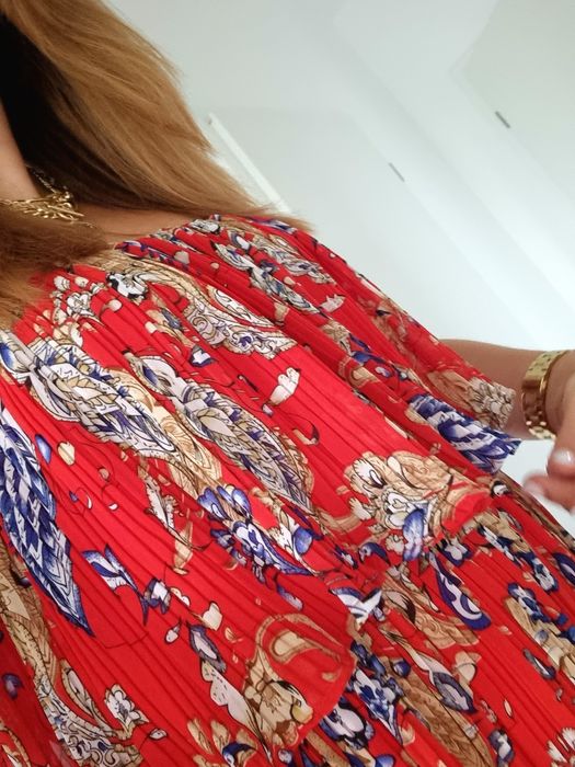 Kombinezon na cienkich, regulowanych ramiączkach