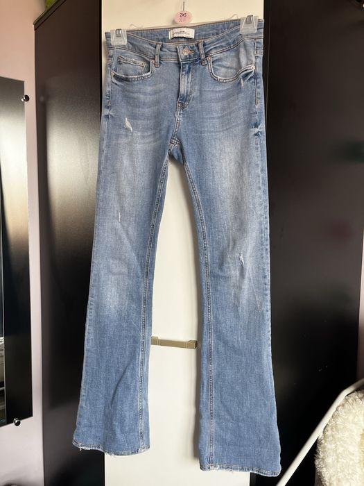 spodnie jeansowe rurki dzwony modne retro M Zara
