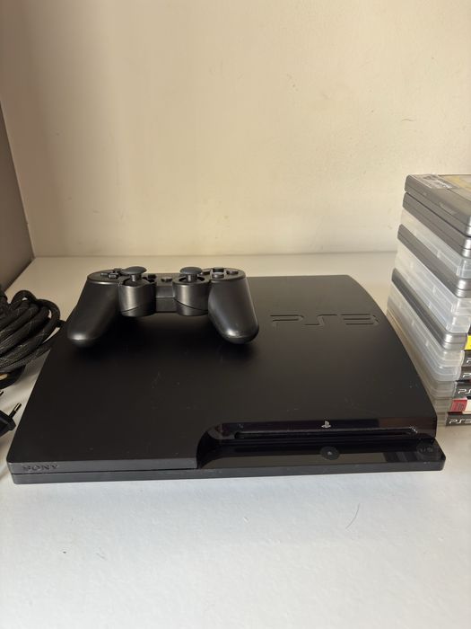 PS3 Slim + 24 jogos