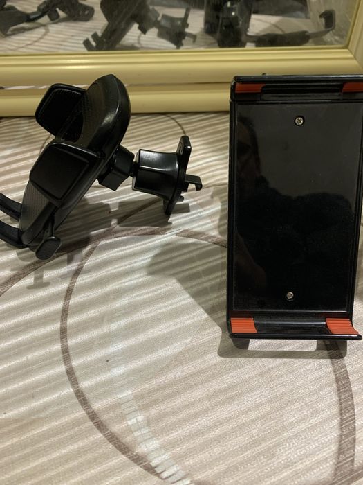 Автотримачи для телефону