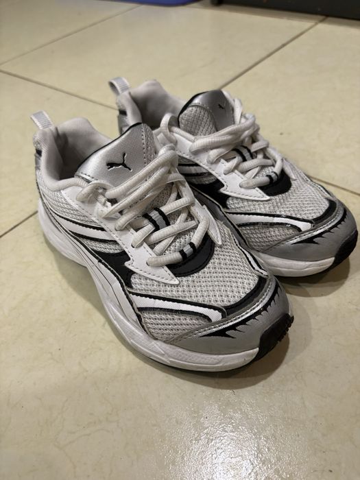 Кросівки Puma і Nike
