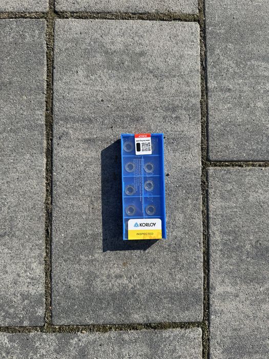 płytki skrawające marki KORLOY, model RPGT1003M0E-AK H01.