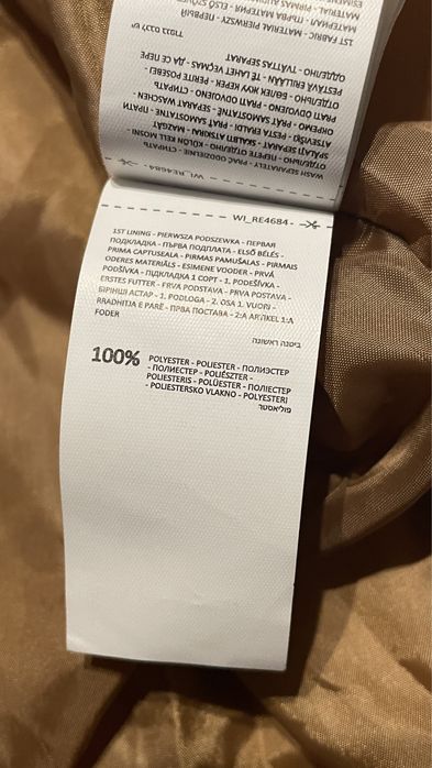 Beżowy puchowy płaszcz damski reserved r.s