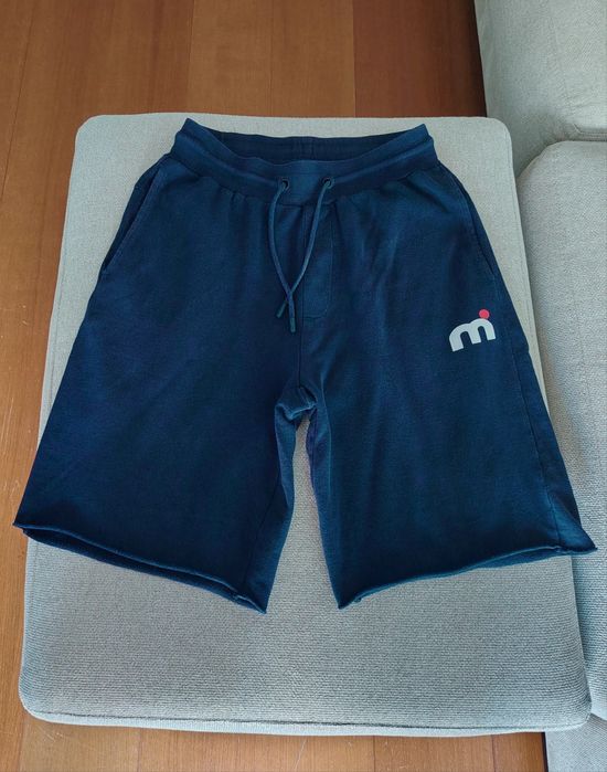 Calções Mistral com bolsos