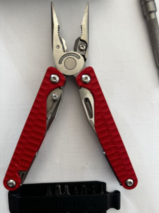 leatherman charge plus red g10