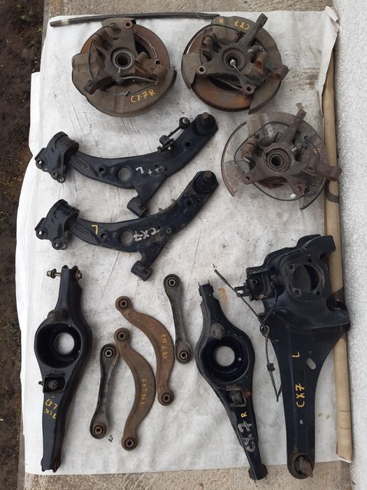 Цапфа Mazda CX7 ричаг рычаг ступица