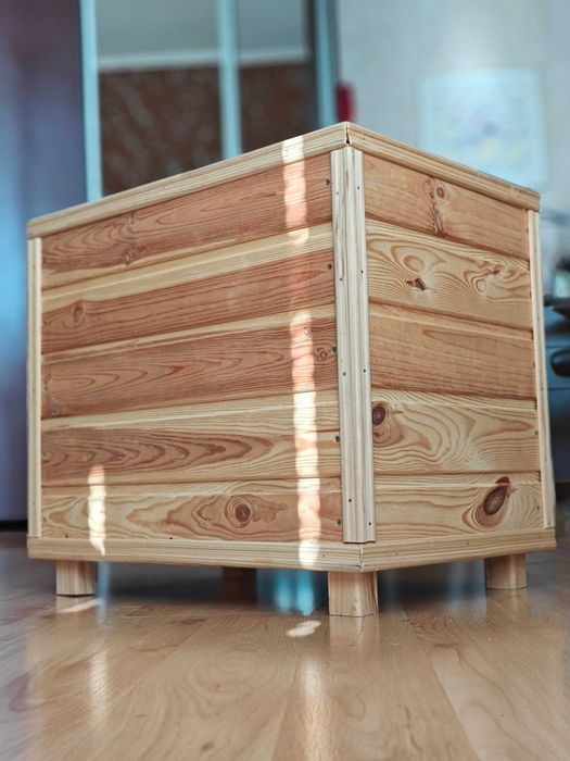 Дерев'яний будиночок для кішки