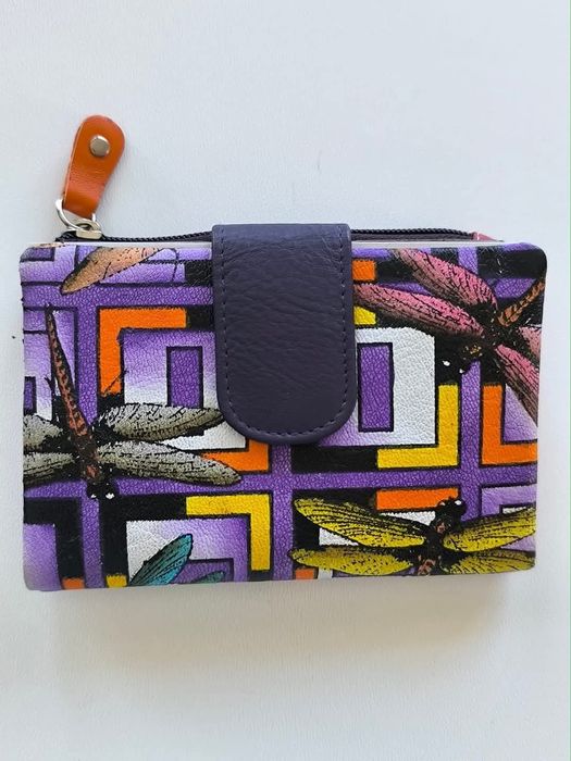 Carteira em pele 
Novo na caixa 
Tamanho 14*10