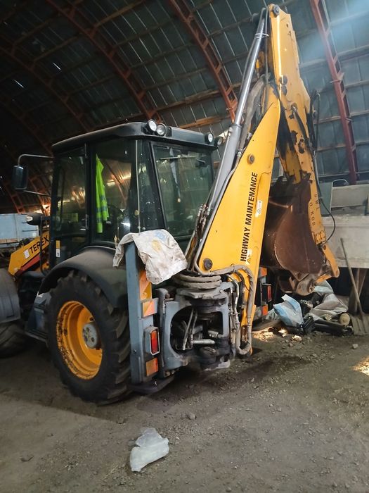 Экскаватор погрузчик  TEREX 860