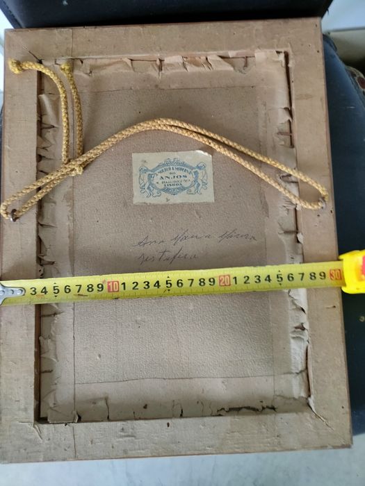 Moldura antiga com imagem da "Imaculada Conceição".