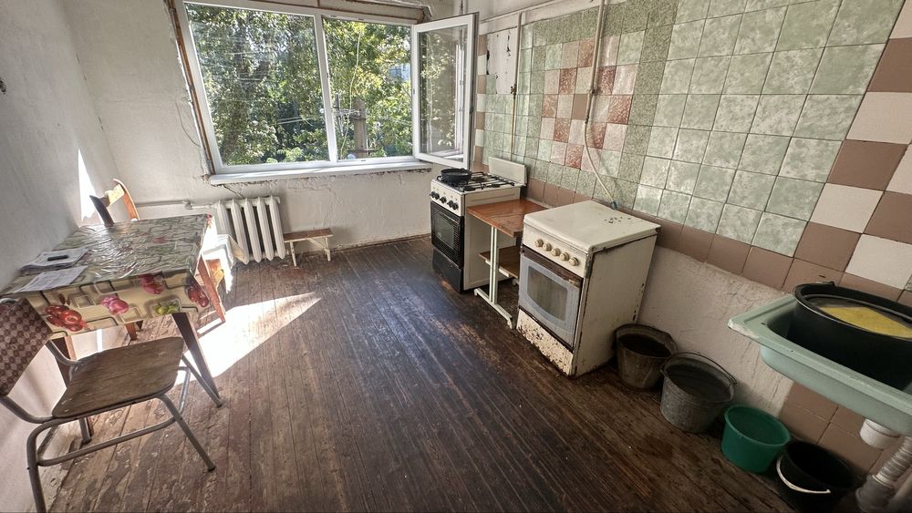 Комната в коммуне в Малиновском районе