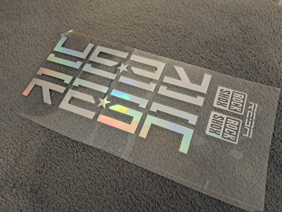 RockShox REBA Naklejki Amortyzatora Odblaskowe Srebrne Kameleon NOWE