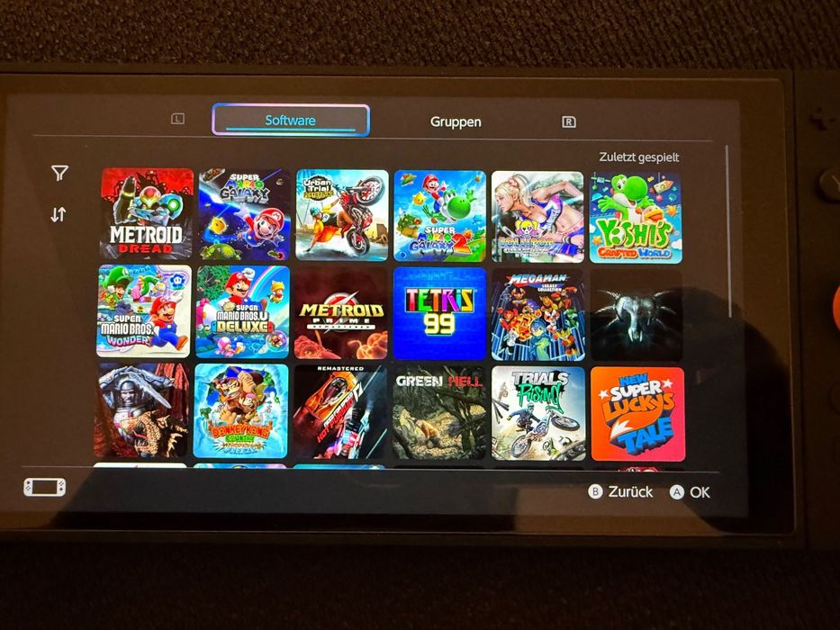 Nintendo Switch V2 incluindo 7 jogos + conta com vários jogos