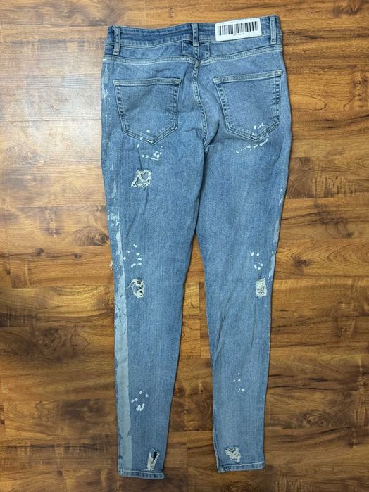 Spodnie jeansowe z rozdarciami dziurami jeansy Sinner Jaffary W28 L 40