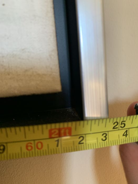 Quadro grande com moldura em preto e inox