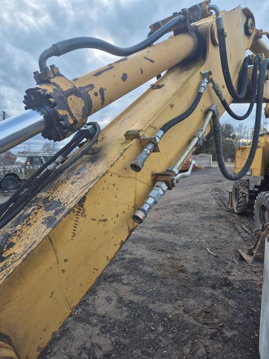 CAT 212 koparka kołowa obrotowa