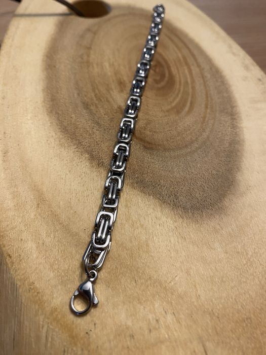 Nowa gruba bransoletka ze stali nierdzewnej. wzór splot królewski