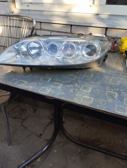 Фара левая Мазда6 2002-2007г.