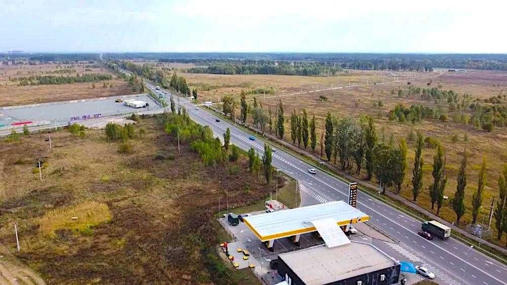 Продається Фасадна Земельна Ділянка під склад, промисловість біля Бучі, траси Київ-Ковель.