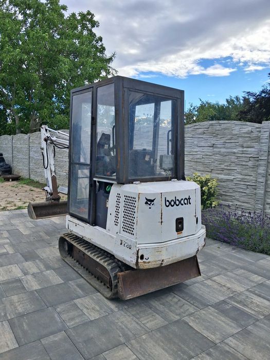 Minikoparka Bobcat x220, caterpillar cat liebherr jcb new holand