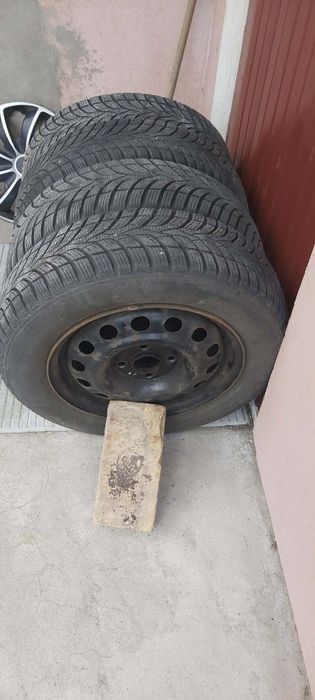 Koła stalowe 175/65r14 z oponami + kołpaki