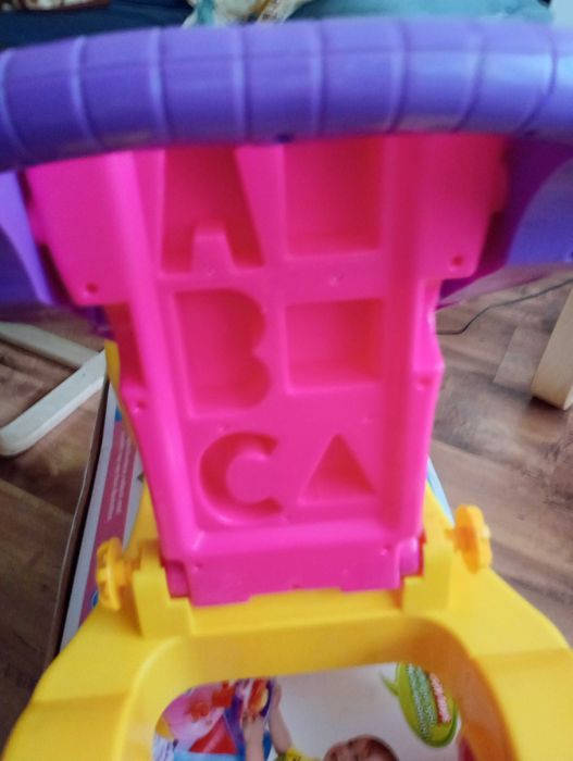 Jeździk chodzik pchacz interaktywny baby walker 18M+