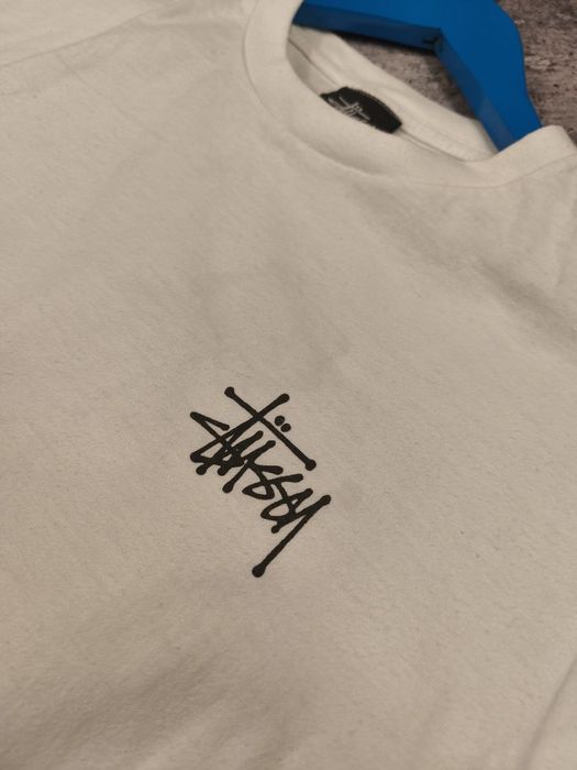 біла чоловіча футболка Stussy із графічним принтом дракона на спині