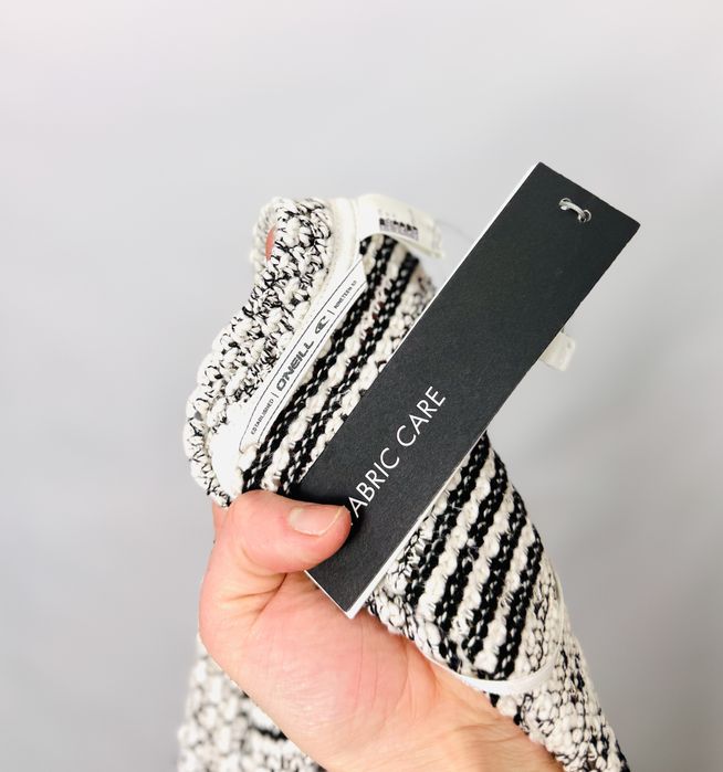 Kremowo-czarna narzutka w paski S 36