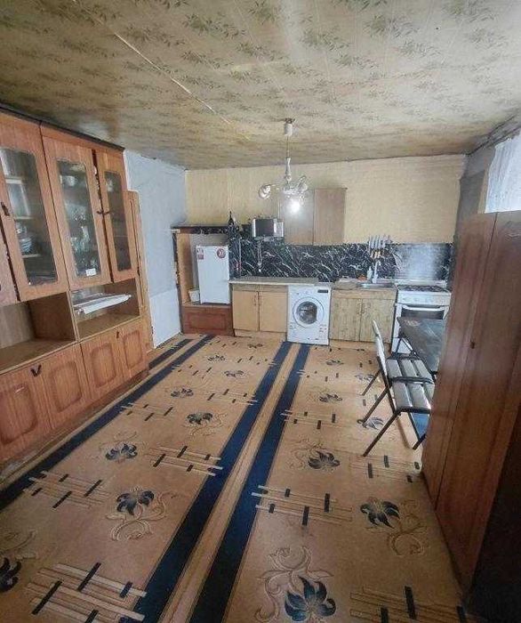 У продажу цегляний будинок