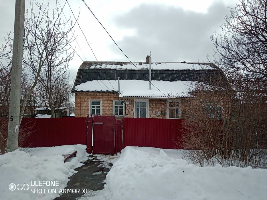 Двоповерховий будинок (половина) Нові Петрівці