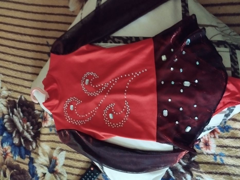 Купальники для гімнастики